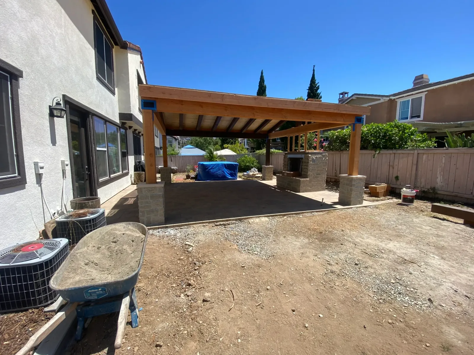 Coastal Carlsbad outdoor kitchen with marine-grade stainless grill and patio cover